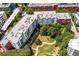 A captivating aerial view of the apartment complex, highlighting the building's architecture and landscaping at 245 N N Highland Ne Ave # 220, Atlanta, GA 30307