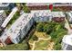Overhead view shows well-maintained landscaping and mature trees that surround the property at 245 N N Highland Ne Ave # 220, Atlanta, GA 30307