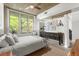 Stylish bedroom with modern decor, neutral color scheme, and window views, promotes relaxation at 245 N N Highland Ne Ave # 220, Atlanta, GA 30307