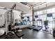 Well-equipped gym with modern fitness equipment and large mirrors for a comprehensive workout experience at 245 N N Highland Ne Ave # 220, Atlanta, GA 30307
