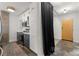 Well-lit kitchen with stainless steel appliances and easy access to the entry door at 245 N N Highland Ne Ave # 220, Atlanta, GA 30307
