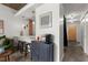 Living room view of kitchen with countertop seating and coffee station at 245 N N Highland Ne Ave # 220, Atlanta, GA 30307