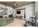 Spacious living room and dining area with an open concept and a modern kitchen at 245 N N Highland Ne Ave # 220, Atlanta, GA 30307
