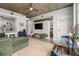 Open floor plan features a living room, dining space, and kitchen, designed for entertaining at 245 N N Highland Ne Ave # 220, Atlanta, GA 30307