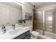 Bathroom featuring a shower and vanity sink at 2625 Cross Springs Dr, Cumming, GA 30041
