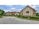 Community clubhouse with stone accents, well-kept landscaping, and convenient parking at 2625 Cross Springs Dr, Cumming, GA 30041