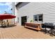 Outdoor deck with a grill and table provides an inviting space for cooking and dining at 2625 Cross Springs Dr, Cumming, GA 30041