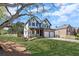 Beautiful two-story home with a welcoming front porch, attached garage, and well-maintained lawn at 2625 Cross Springs Dr, Cumming, GA 30041