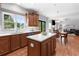 Bright kitchen with stainless appliances, a center island, and an open view to the backyard at 2625 Cross Springs Dr, Cumming, GA 30041