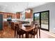 Updated kitchen and dining area with modern appliances, an island, and a stylish dining set at 2625 Cross Springs Dr, Cumming, GA 30041