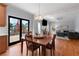 Open-concept kitchen and dining room with views of the backyard and the cozy living room at 2625 Cross Springs Dr, Cumming, GA 30041