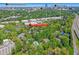 Aerial view of the community, with lush greenery, nearby amenities, and skyline in the background at 305 Summit North Ne Dr # 305, Atlanta, GA 30324