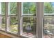 Sunroom window view of backyard showcasing lush greenery and a charming gazebo at 305 Summit North Ne Dr # 305, Atlanta, GA 30324