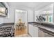 Bright kitchen features stainless steel appliances, granite countertops, and a charming breakfast nook at 305 Summit North Ne Dr # 305, Atlanta, GA 30324