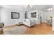 Bright living room featuring hardwood floors, white walls, modern lighting, and comfortable seating at 305 Summit North Ne Dr # 305, Atlanta, GA 30324