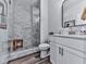 Modern bathroom featuring a glass-enclosed shower with stylish tile and a sleek vanity, offering a spa-like experience at 6380 Cortland Walk, Alpharetta, GA 30005