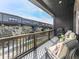 Inviting outdoor patio with comfortable seating, perfect for relaxing and enjoying the neighborhood view at 6380 Cortland Walk, Alpharetta, GA 30005