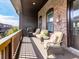 Comfortable outdoor patio featuring lounge chairs and grill with a view of the neighborhood at 6380 Cortland Walk, Alpharetta, GA 30005