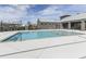 Community swimming pool featuring pristine blue water and lounge seating at 6380 Cortland Walk, Alpharetta, GA 30005