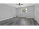 Neat bedroom with gray walls, gray floors, ceiling fan, and good light at 3326 Chappel Lane, Peachtree Corners, GA 30360
