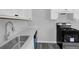Kitchen area with stainless steel sink and appliances at 3326 Chappel Lane, Peachtree Corners, GA 30360