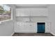 Bright kitchen featuring white cabinets, quartz countertops, and a blue dishwasher at 3326 Chappel Lane, Peachtree Corners, GA 30360