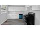 Kitchen with white cabinets, a blue dishwasher, and stainless steel stove at 3326 Chappel Lane, Peachtree Corners, GA 30360