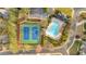 Aerial view of a community pool, tennis courts, and clubhouse with lush landscaping at 850 Highland Bend Cv, Alpharetta, GA 30022