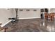 Unfurnished basement offering plenty of potential for customization with dark stained concrete flooring at 850 Highland Bend Cv, Alpharetta, GA 30022