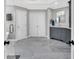 Spacious primary bathroom featuring double closets, double doors, and separate vanities at 850 Highland Bend Cv, Alpharetta, GA 30022
