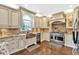 Gourmet kitchen featuring custom cabinetry, granite countertops, and stainless steel appliances at 850 Highland Bend Cv, Alpharetta, GA 30022