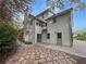 Charming two-story home featuring stone pathway and access to the home's exterior doors at 8608 Creekview Ct, Douglasville, GA 30135