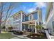 Charming two-story home featuring blue siding, a welcoming front porch and professionally landscaped yard at 1338 Dupont Nw Park, Atlanta, GA 30318
