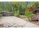 Spacious backyard featuring a shed, basketball hoop, and patio at 1884 Montrose Dr, East Point, GA 30344