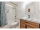Updated bathroom features subway tile, a modern vanity, and a shower-tub combination at 1884 Montrose Dr, East Point, GA 30344