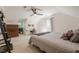 Spacious bedroom with a vaulted ceiling, ceiling fan, a double door to the deck, and plenty of natural light at 1884 Montrose Dr, East Point, GA 30344