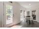 Cozy breakfast nook with table, chairs, and lots of sunlight at 1884 Montrose Dr, East Point, GA 30344