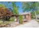 Exterior view of a brick home with a screened porch and deck at 1884 Montrose Dr, East Point, GA 30344