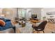 Comfortable living room with stylish decor and ample natural light from the windows at 1884 Montrose Dr, East Point, GA 30344