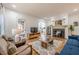 Bright living room with hardwood floors, fireplace, and neutral decor at 1884 Montrose Dr, East Point, GA 30344