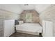 Inviting bedroom nook with shiplap accent wall and built-in storage at 1961 Flowering Dr, Grayson, GA 30017