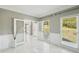 Bright entryway featuring marble flooring, high ceilings and natural light at 1961 Flowering Dr, Grayson, GA 30017