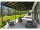 Covered patio features an outdoor fire pit and seating for relaxing outdoors at 1961 Flowering Dr, Grayson, GA 30017