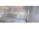 Room featuring unfinished walls, flooring and single window offering a sunny view at 3689 Ashwood Se Dr, Smyrna, GA 30080