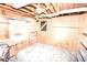View of shed with plywood walls, beamed ceiling, windows and storage shelves at 3689 Ashwood Se Dr, Smyrna, GA 30080