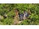 Aerial view of a home nestled among lush trees, showcasing its private and serene setting at 1183 Woods Ne Cir, Atlanta, GA 30324