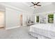 Bright bedroom with a walk-in closet, plenty of windows, and comfortable sitting area at 1183 Woods Ne Cir, Atlanta, GA 30324