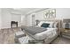 This bedroom features plush bedding and contemporary accents, all bathed in natural light at 1183 Woods Ne Cir, Atlanta, GA 30324