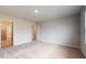 Spacious bedroom with carpet flooring and access to the en-suite bathroom at 160 Weldon Rd, Mcdonough, GA 30253
