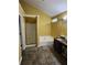 Bathroom featuring a soaking tub and separate shower at 645 Birchberry Sw Ter, Atlanta, GA 30331